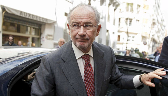 former imf chief rodrigo rato gets out of a car in front of his office in madrid